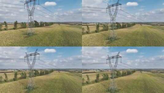 农田里的高压电线电力塔高清在线视频素材下载