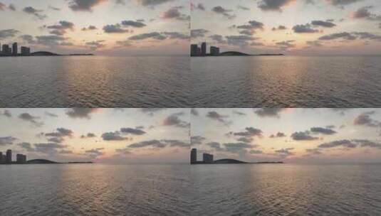 航拍威海国际海水浴场金海湾海上晚霞落日高清在线视频素材下载