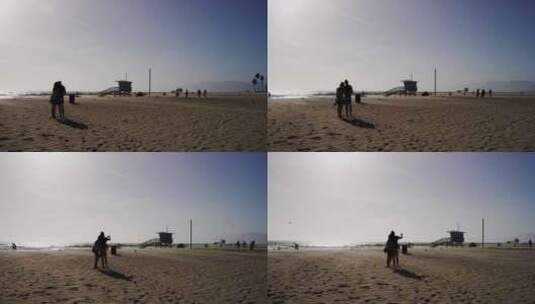 4K平移轻松的人在海滩上散步的镜头高清在线视频素材下载