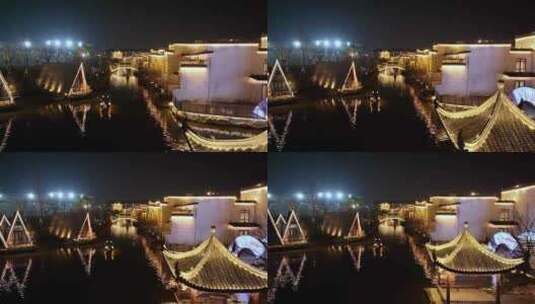 小船在河道中前行江南水乡古镇徽派建筑飞檐高清在线视频素材下载