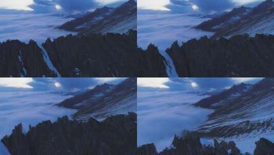 无人机飞越山峰航拍巴郎山雪山云海日落高清在线视频素材下载