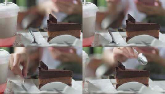 女人正在吃巧克力蛋糕或甜点。高清在线视频素材下载
