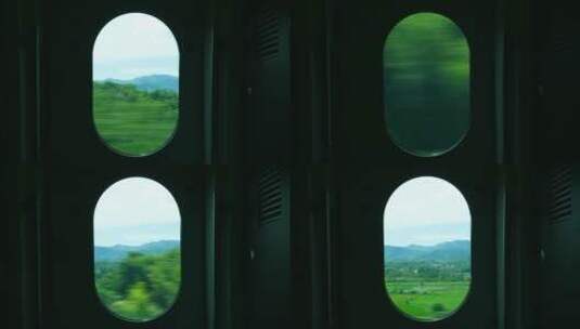 高铁车窗，窗外飞速闪过的风景视频素材高清在线视频素材下载