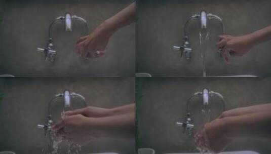 拧开水龙头洗手的特写镜头高清在线视频素材下载
