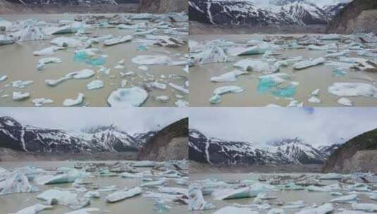 航拍夏天来古冰川冰碛湖的浮冰高清在线视频素材下载