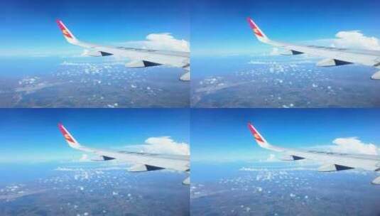 飞机飞行过程中窗外飞跃海南岛与山脉风景高清在线视频素材下载