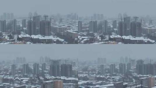 黑龙江牡丹江市雪天城市建筑群航拍高清在线视频素材下载