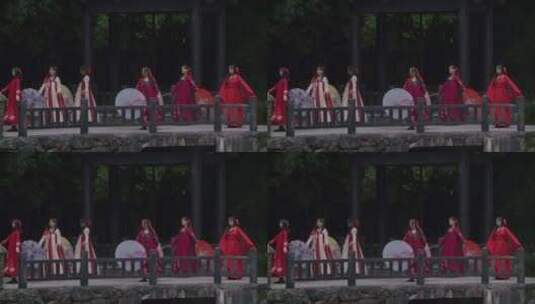 湖北宜昌红裙古装撑伞跳舞地拍高清在线视频素材下载