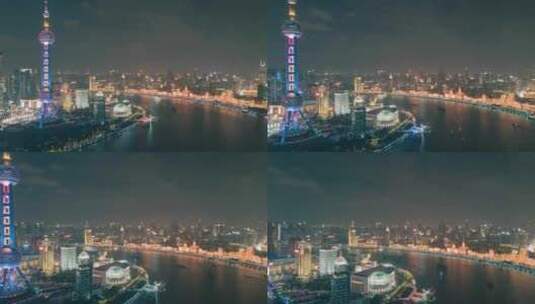 航拍上海黄浦江沿岸建筑群夜景延时高清在线视频素材下载