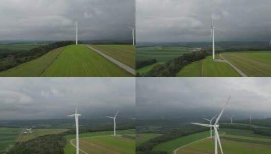 航拍绿色农场风力发电机清洁能源绿色风能高清在线视频素材下载