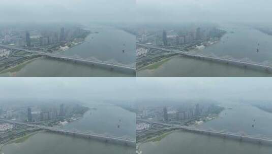 南昌朝阳大桥航拍赣江两岸阴天城市建筑风景高清在线视频素材下载