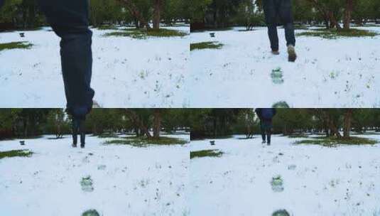 雪地上行走的人的脚印高清在线视频素材下载