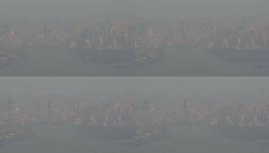 航拍武汉东湖公园清晨大雾城市建筑高清在线视频素材下载
