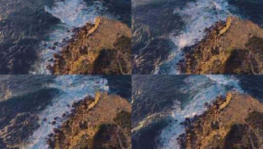 葡萄牙日落时岩石海岸海浪的空中自上而下拍高清在线视频素材下载