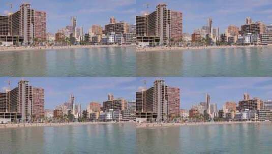 西班牙贝尼多姆镇在夏季显示海滩的镜头高清在线视频素材下载