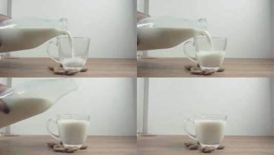 健康早餐喝牛奶乳制品倒牛奶高清在线视频素材下载
