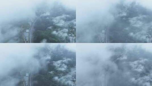 穿云拍摄桂林山区雨雾缭绕下的高速公路高清在线视频素材下载