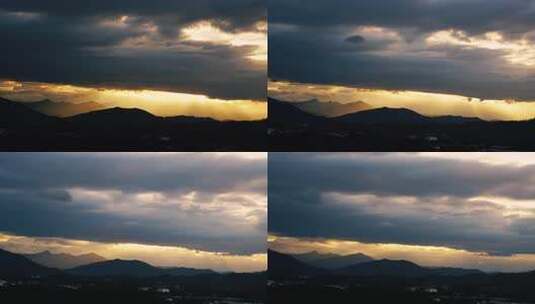 山峦之上夕阳穿透云层景观高清在线视频素材下载