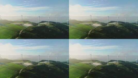 山脉上的新能源风力发电航拍镜头高清在线视频素材下载