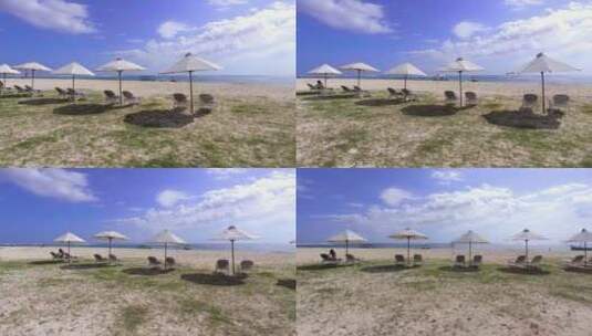 航拍海边沙滩椅太阳伞度假时光高清在线视频素材下载