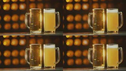 橙色背景下的两杯啤酒高清在线视频素材下载