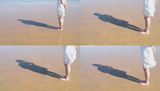 沙滩上影子一个人在海边看海背影影子阳光海高清在线视频素材下载