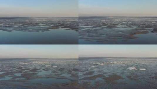 航拍辽宁丹东海岸滩涂浮冰高清在线视频素材下载