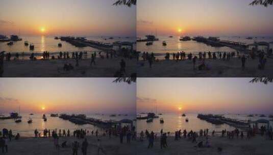 惠州巽寮湾海滩游客码头船只日落延时高清在线视频素材下载