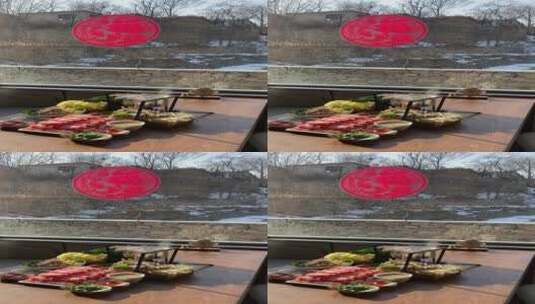 春节乡村民宿贴窗花，吃热气腾腾羊肉小火锅高清在线视频素材下载