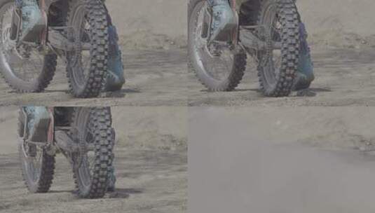 越野摩托车起步泥土和石头从轮子下飞起高清在线视频素材下载