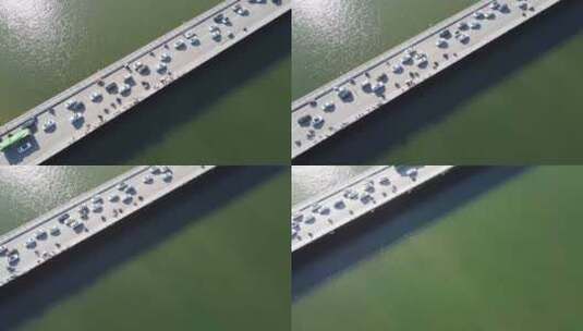 俯视横移大桥车流对面拉到河面高清在线视频素材下载