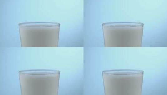 往杯子中倒牛奶高清在线视频素材下载