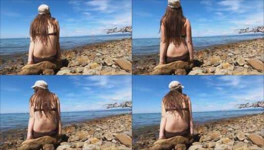女人在海岸欣赏海景高清在线视频素材下载