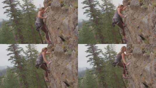 攀岩者攀登陡峭岩壁的侧视图高清在线视频素材下载