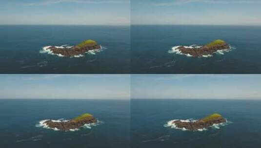 海洋中的岩石岛的鸟瞰图高清在线视频素材下载