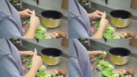居家做饭的中国女性高清在线视频素材下载