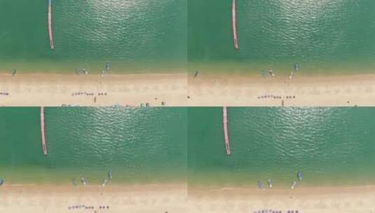 俯拍蓝色海洋沙滩游船高清在线视频素材下载
