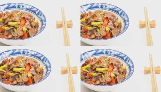 芹菜炒鸡杂美食菜品4k滑轨平移高清在线视频素材下载