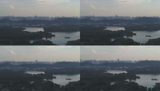 武汉东湖梅园码头黄昏湖面远处楼房高清在线视频素材下载