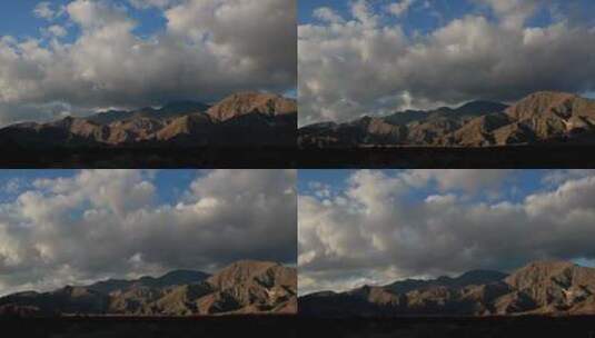 延时拍摄穿过山脉的白云高清在线视频素材下载