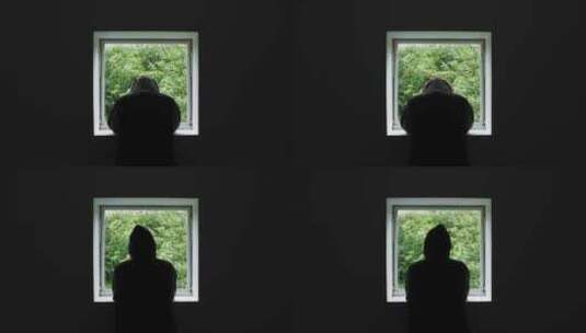男人在窗户前看向窗外早上早晨起床高清在线视频素材下载