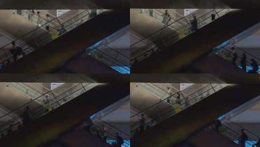 高铁站扶梯上下的旅客高清在线视频素材下载