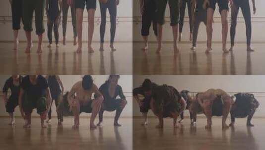 现代舞者在舞蹈室着陆时跳跃并拥抱膝盖高清在线视频素材下载