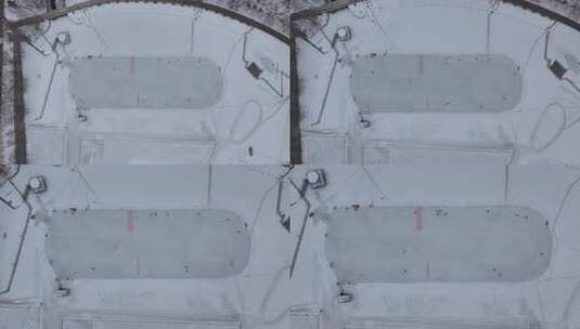 俯拍雪地冰场全景 有人在冰面活动高清在线视频素材下载