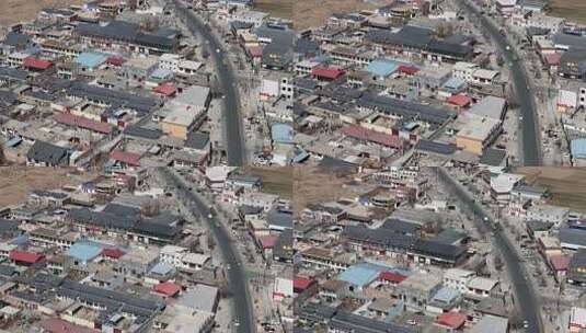 乡村民居及道路鸟瞰景象高清在线视频素材下载