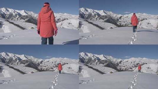 山里的旅行者在新鲜的雪中留下了一条小径高清在线视频素材下载