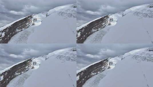 航拍攀登慕士塔格峰雪山冰川的登山队高清在线视频素材下载