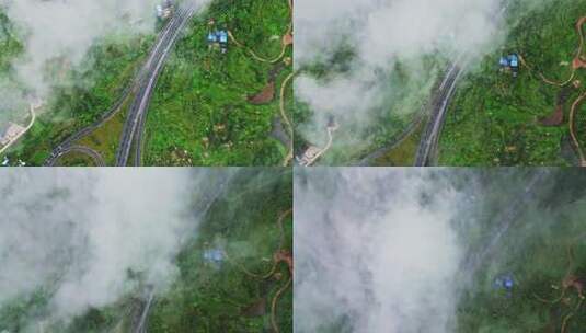 6月大山雨季穿云航拍小县城风光高清在线视频素材下载