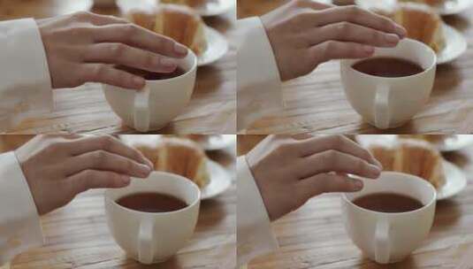 手指划过咖啡杯口高清在线视频素材下载