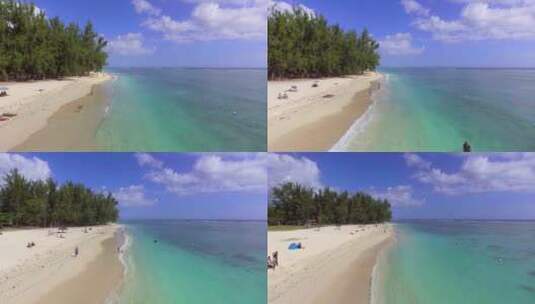 航拍海边阳光沙滩海浪高清在线视频素材下载